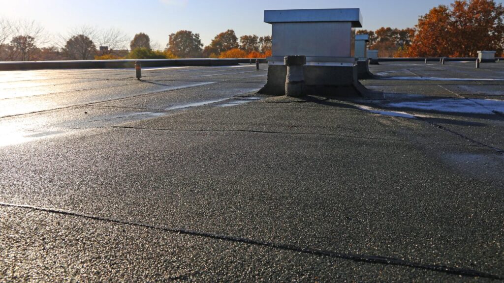 Newly sealed flat roof on a commercial building