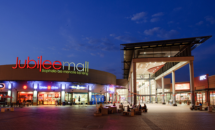 Exterior entrance of Jubilee Mall at night