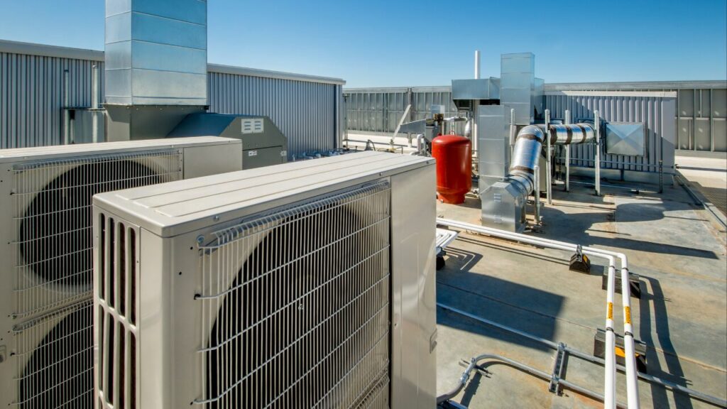 Rooftop HVAC units and ducting on a commercial building